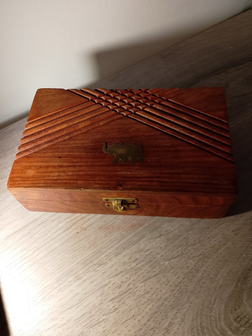 Handcrafted Indian sheesman wood jewelry storage box with brass elephants