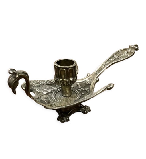 Brass peacock candlestick