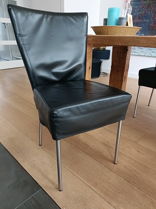 4 Lederen eetkamer stoelen 