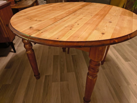 Image 1 of Extendable dining table round & oval