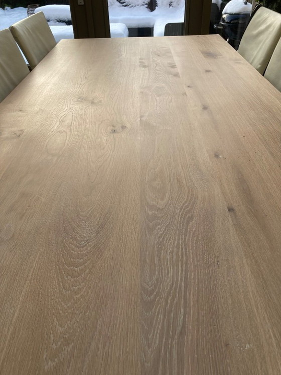 Image 1 of Bert plantagie eettafel en 6 leren stoelen