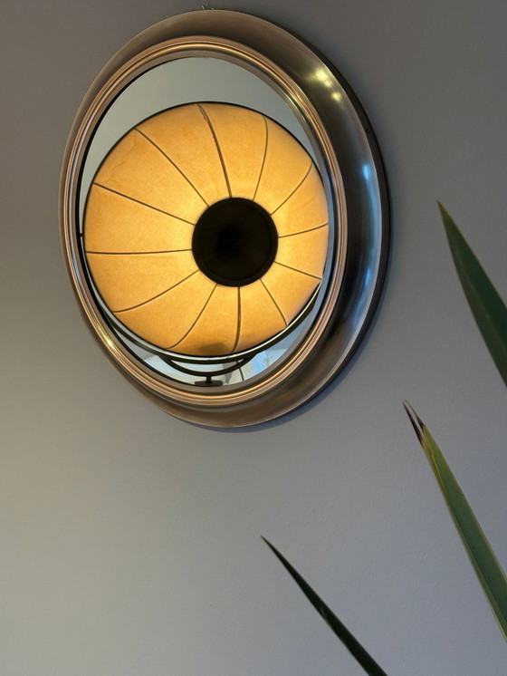Image 1 of round mirror with metal frame, dating back to the 1970s