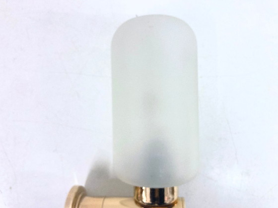 Image 1 of Dos apliques de pared de Keuco, fabricados en metal chapado en oro y cristal.