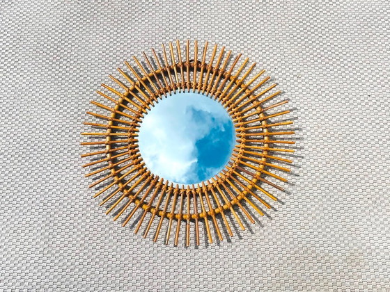 Image 1 of Large rattan sun mirror 68 cm. Vintage 70s