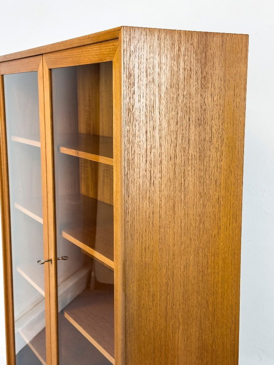 Image 1 of Mobiletto in teak con ante in vetro di WK Möbel, anni '70