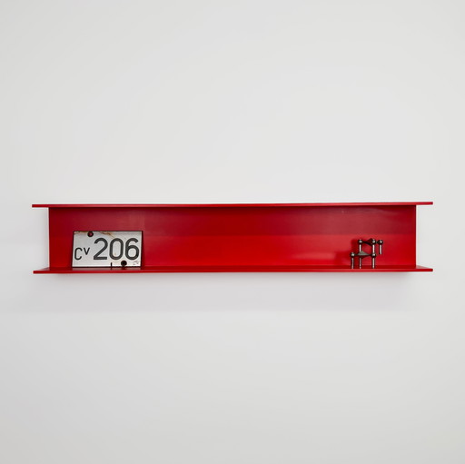 Red wall shelf by Walter Wirz for Wilhelm Renz