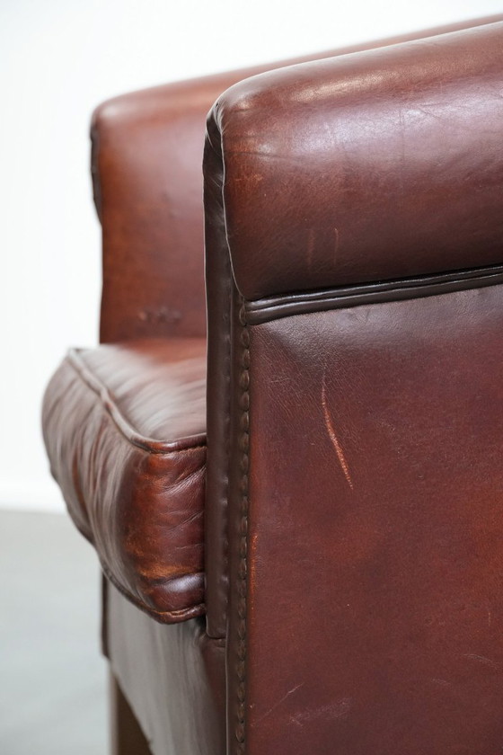 Image 1 of 2 x Vintage schapenleren clubfauteuil met siernagels 