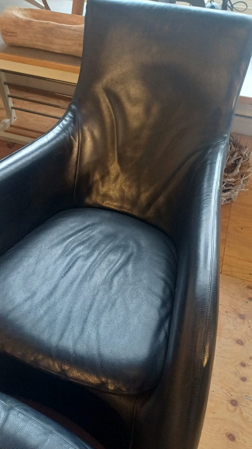 Montis Loge Sessel und Hocker, schwarzes Leder