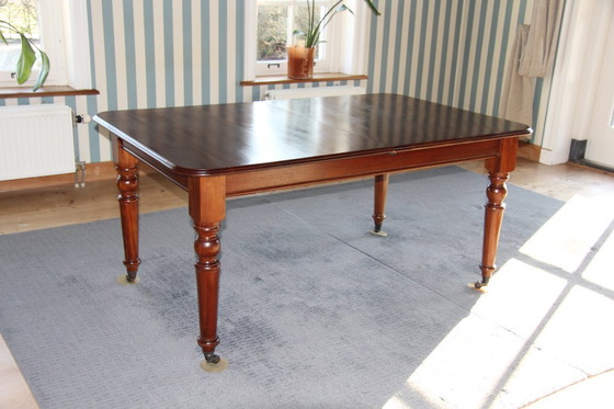 Image 1 of Victorian mahogany folding dining table by Eichholtz