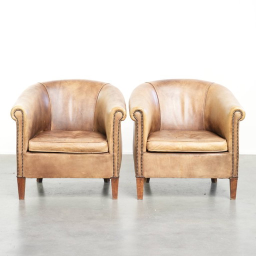 2 poltrone club in pelle bovina stile inglese vintage in una splendida combinazione di colori chiari