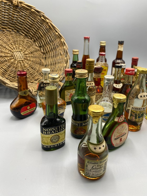 32 vintage miniature spirit bottles and large wicker basket – Decorative Objects, Glass, Mid Century Modern (photo 3 of 8)