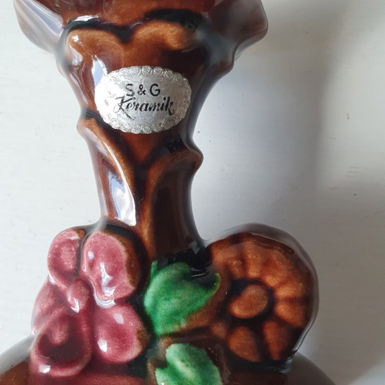 Image 1 of Scheurig&Greulich. Leeuw met klok en 2 kandelaars 1920-1930