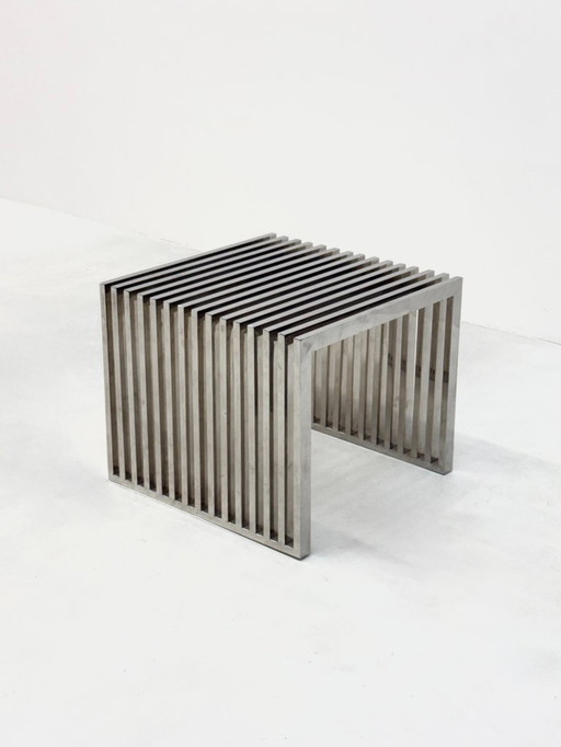 Eichholtz Carlisle side table / bar bench in polished stainless steel