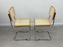 Set of 2 Cesca tubular frame chairs, webbing in top condition