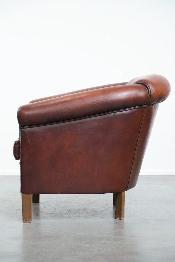 Image 1 of Vintage schapenleren clubfauteuil met siernagels
