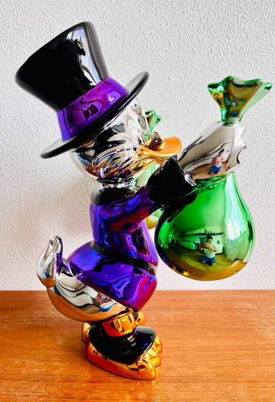 Image 1 of Dagobert Pato obra de arte dinero escultura única LV Información: * Nuevo * Altura: 40 cm. * Anchura: 32 cm.