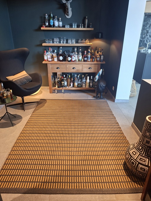Woodnotes Tapijt - Design des ailerons