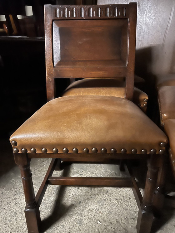 Image 1 of 6 Esszimmerstühle aus Kirschholz mit Schaffellbezug