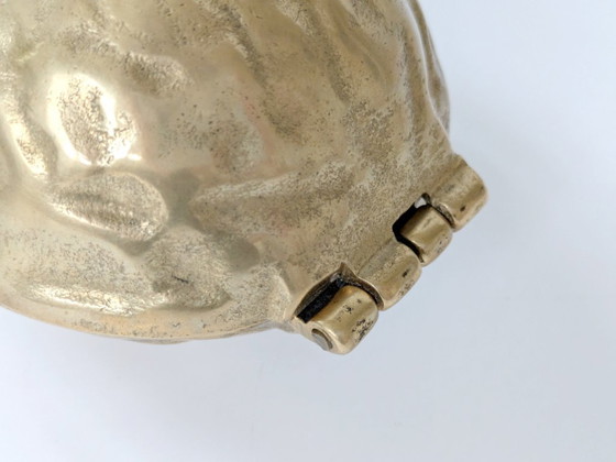 Image 1 of Cascanueces de nogal y latón de mediados de siglo | Decoración navideña de latón macizo