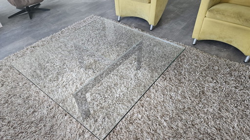 Square glass coffee table