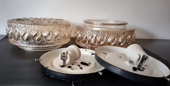 Image 1 of 2 amber-colored glass ceiling lamps from the 60s/70s