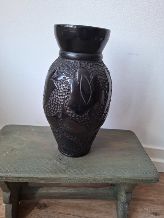 Image 1 of Tall black bakelite vase with unusual tulip decor, beautiful vintage object in very good and usable condition!