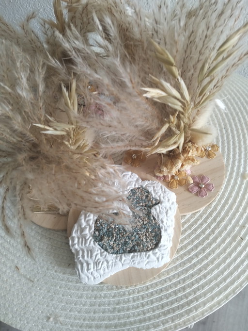 Kunstwerk eend en droogbloemen 