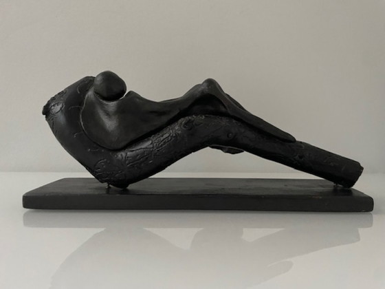 Image 1 of Expressive wooden sculpture with a reclining figure