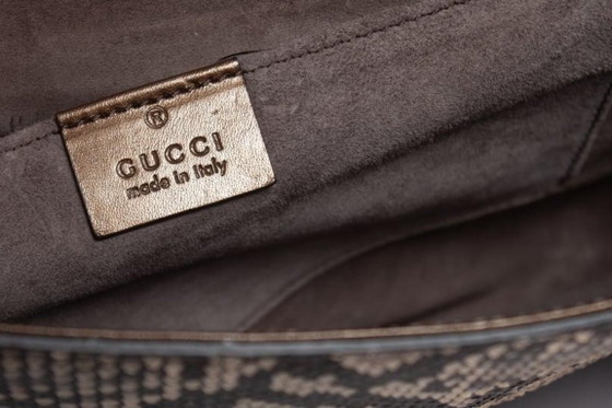 Image 1 of Gucci Clutch aus Pythonleder mit Metallklappe