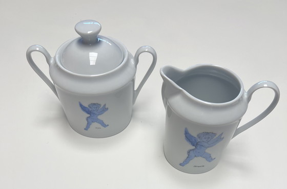 Image 1 of Guillaume Corneille (1922-2010) Brocca per il latte e zuccheriera in porcellana di Limoges L&#39;angelo azzurro da Rubens - Cobr