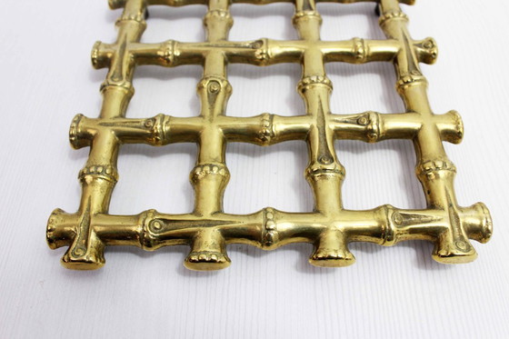 Image 1 of Onderzetter van imitatie bamboe en messing