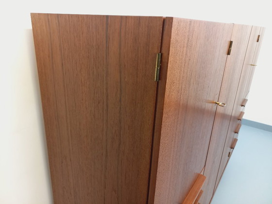 Image 1 of Tall, modernist, vintage Scandinavian sideboard in teak and black metal from the 1960s