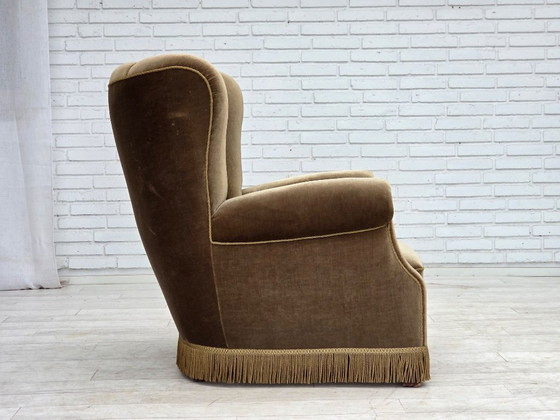 Image 1 of Sillón danés de los años 60, estilo relax, tapizado en terciopelo verde oscuro y madera de fresno.