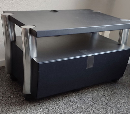 Mueble de TV diseño azul con metal.