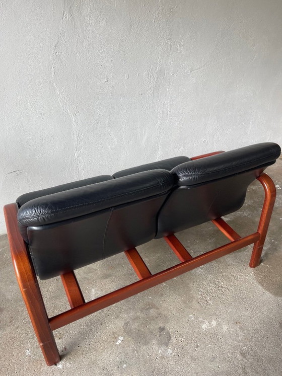 Image 1 of Vintage 2-seater lounge sofa — black leather & solid wood, Italy, 1970s–80s