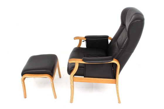 Image 1 of as new, Danish Nordic Easy Lounge Chair / Relax Armchair with stool in oak and leather.