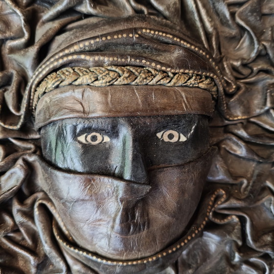 Image 1 of Handcrafted Leather Wall Sculpture 45×45 cm – Tuareg Inspired Mask Relief
