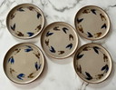 Lotto piatti vintage in gres smaltato con decoro floreale