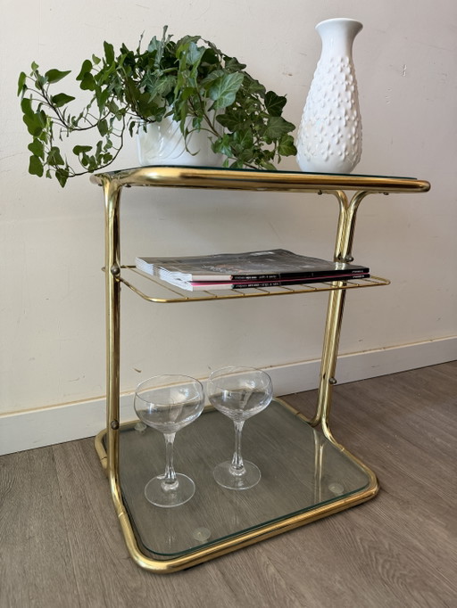 Hollywood Regency bijzettafeltje messing en glad