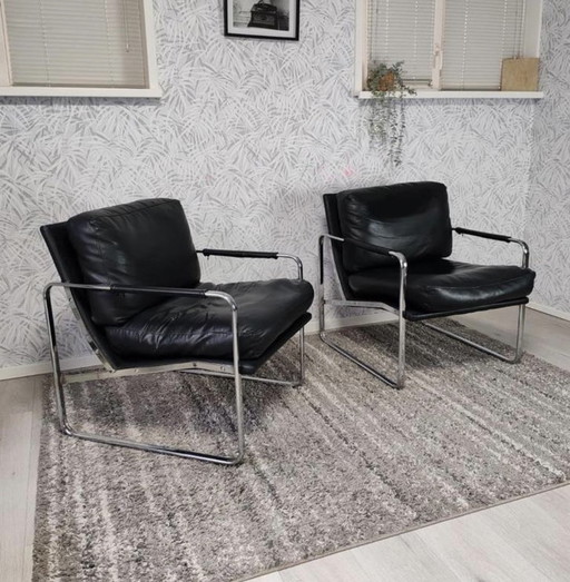Set of 2 stylish designer armchairs – black leather & chrome
