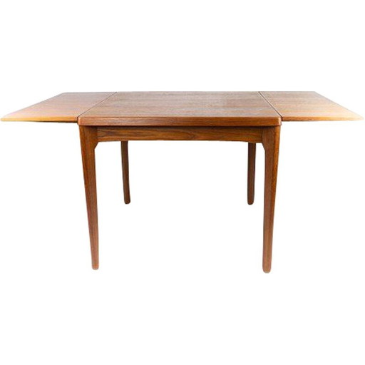 Vintage dining table with extenders in teak by Henning Kjærnulf 1960s