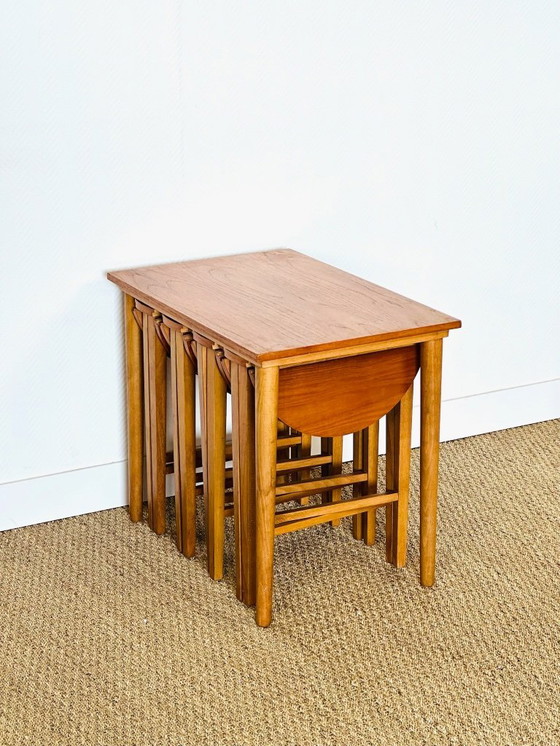 Image 1 of Set van 5 Scandinavische in elkaar passende salontafels van teakhout, 1960