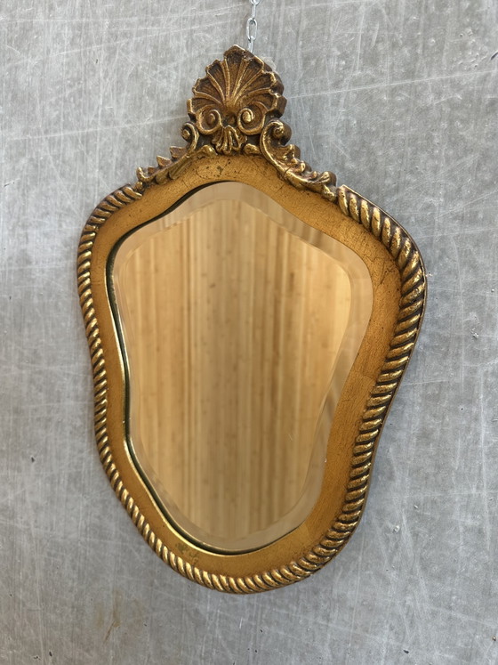 Image 1 of Miroir vintage doré à crête et verre facetté