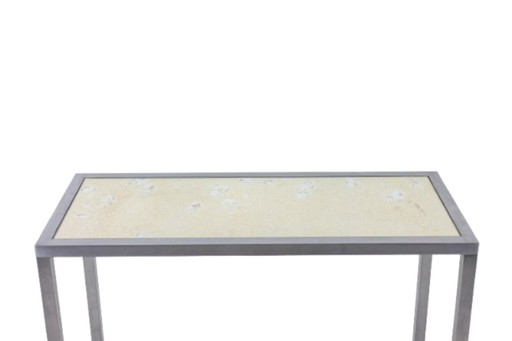Maison Jansen. Console in brushed aluminum with a reverse-painted glass top. 1970
