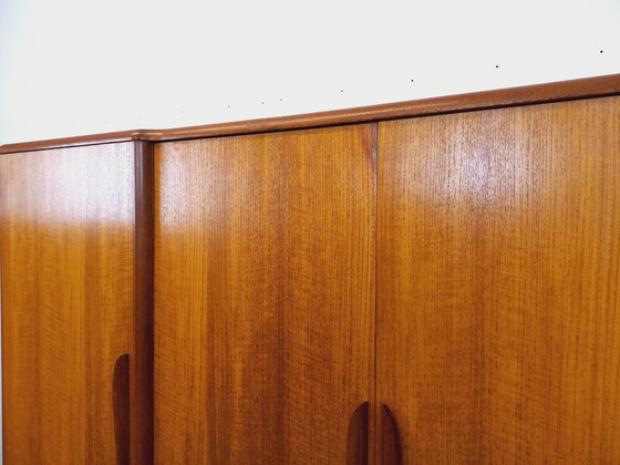 Image 1 of Scandinavische vintage kledingkast in teakhout uit de jaren 60 van ontwerpers Tricoire en Vecchione voor "Meubles TV Paris".