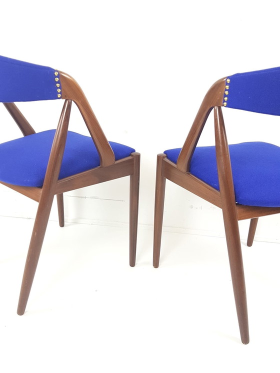 Image 1 of 2 teak stoelen Model 31 Dining Chairs Kai Kristiansen wol De Ploeg nieuw gestoffeerd 