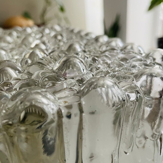 Image 1 of A large flush mount designed for both wall and ceiling application, in the 1970s.  This particular type of fixture tends to sit 