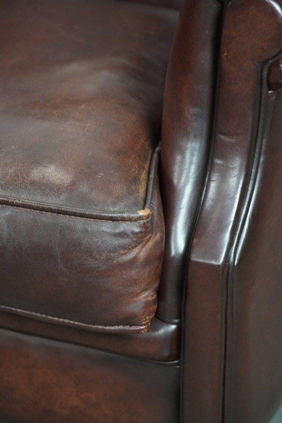 Image 1 of 2 x Schaffellsessel mit zeitlosem Look und wunderschönen dunklen Farben