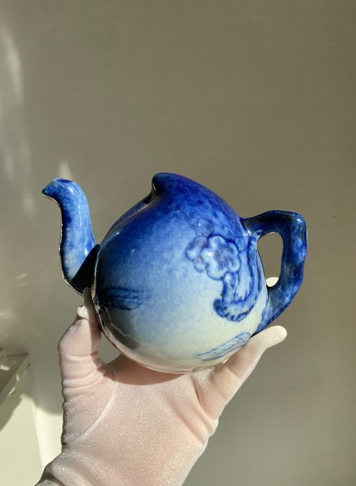 Tetera antigua "Cadogan" con forma de rompecabezas — Vietnam, Indochina francesa, finales del siglo XIX y principios del XX
