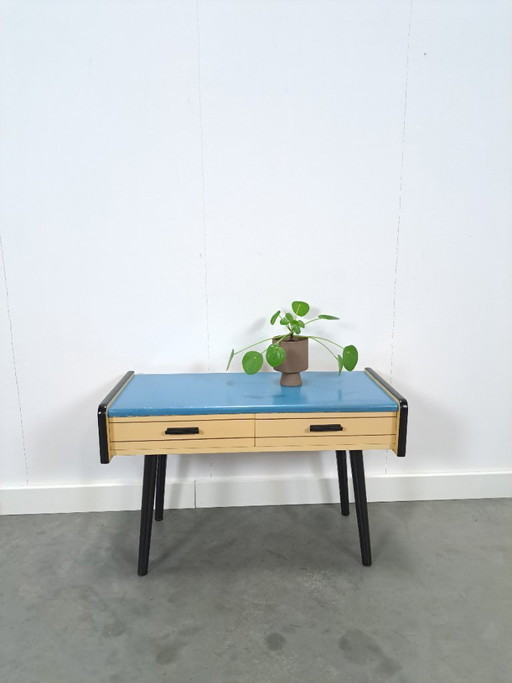 Jaren 50 ladekastje met blauw blad en zwarte poten vintage